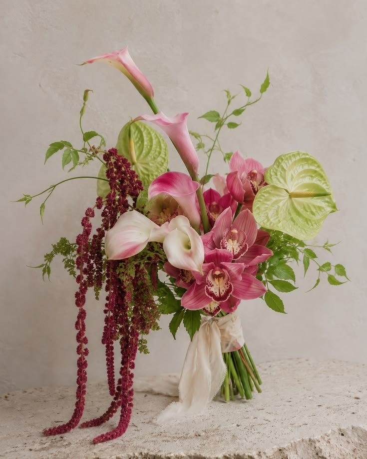 Pink and green tropical-inspired wedding bouquet